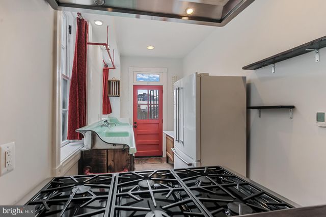 a room with furniture and wooden floor