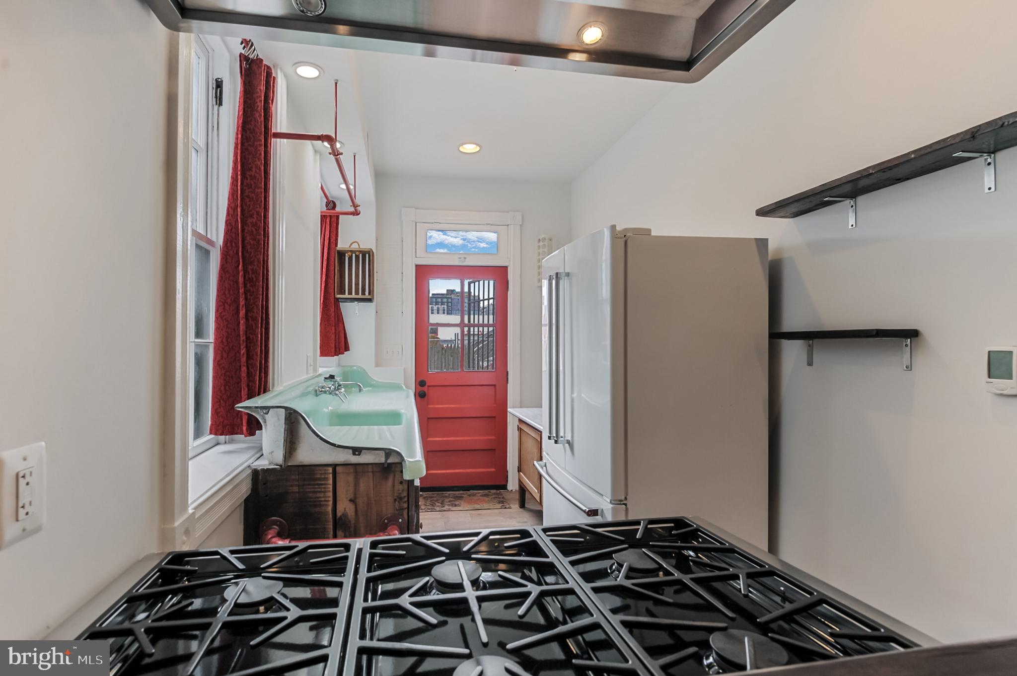 1112 3rd Street Northeast Washington, DC 20002 - Photo 8 of 16 a room with furniture and wooden floor