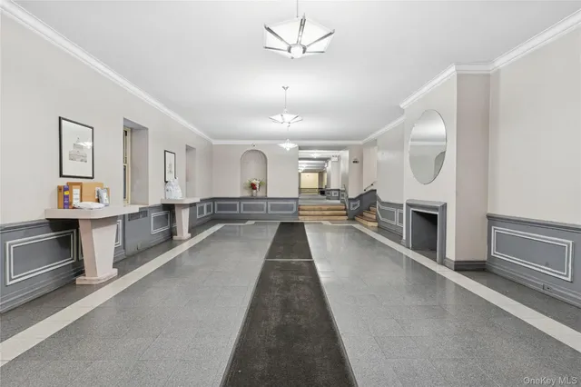 a view of a kitchen with a sink and a fireplace
