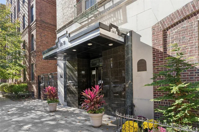 a view of path along with retail shop and buildings