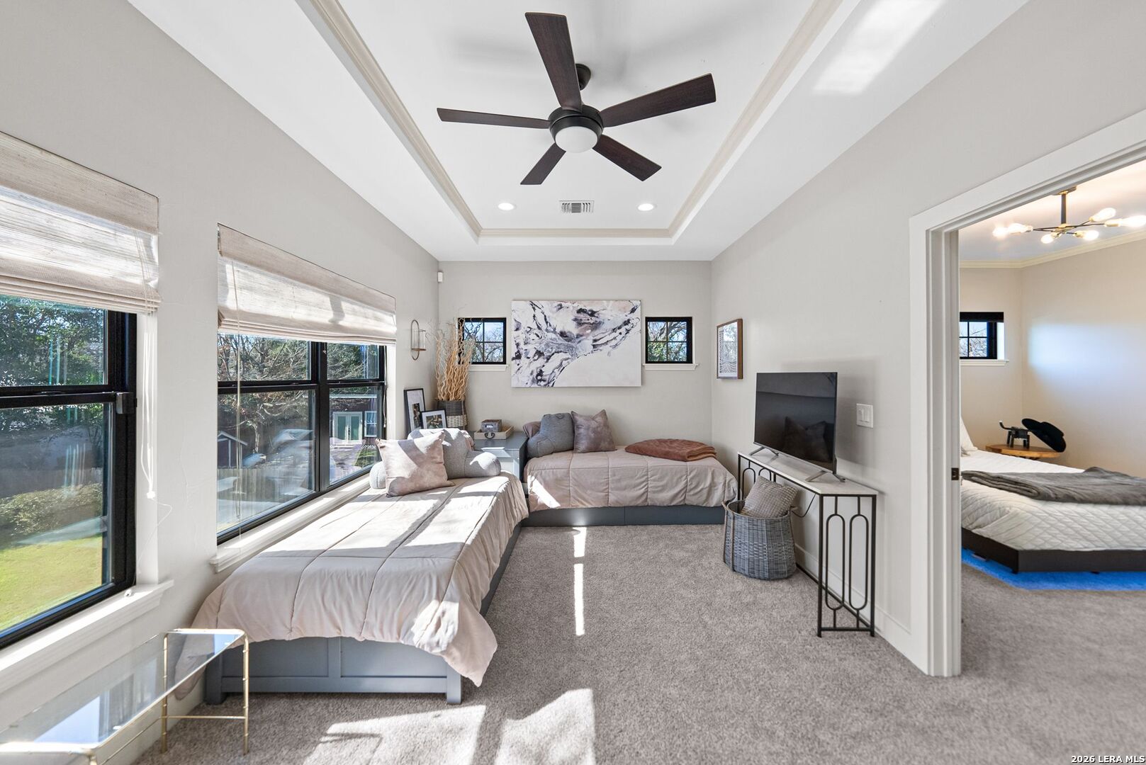 313 James Street Boerne, TX 78006 - Photo 11 of 27 a bedroom with furniture and a large window