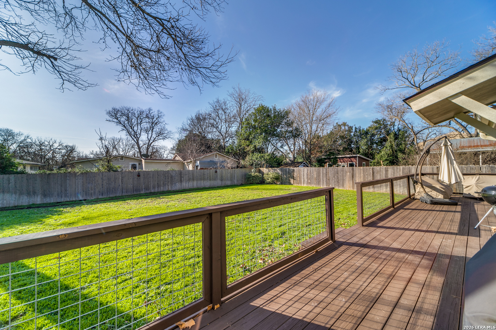 313 James Street Boerne, TX 78006 - Photo 19 of 27 a view of swimming pool with a patio and a yard