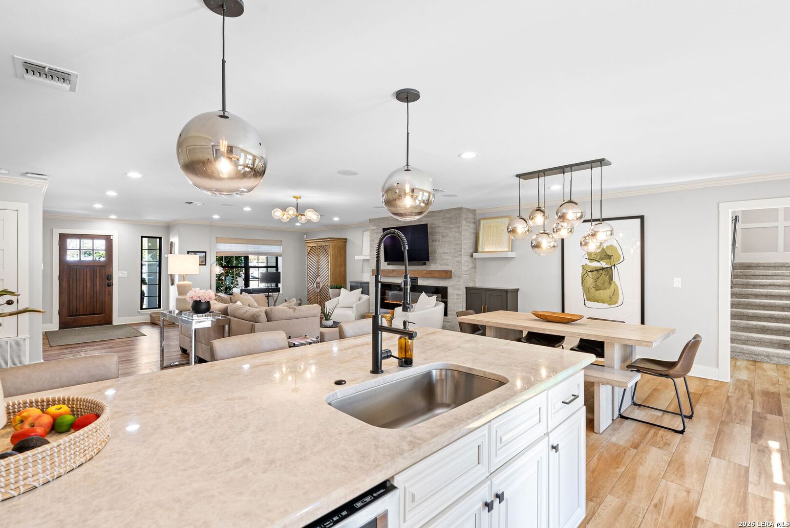 313 James Street Boerne, TX 78006 - Photo 6 of 27 a view of a kitchen and dining table with a sink