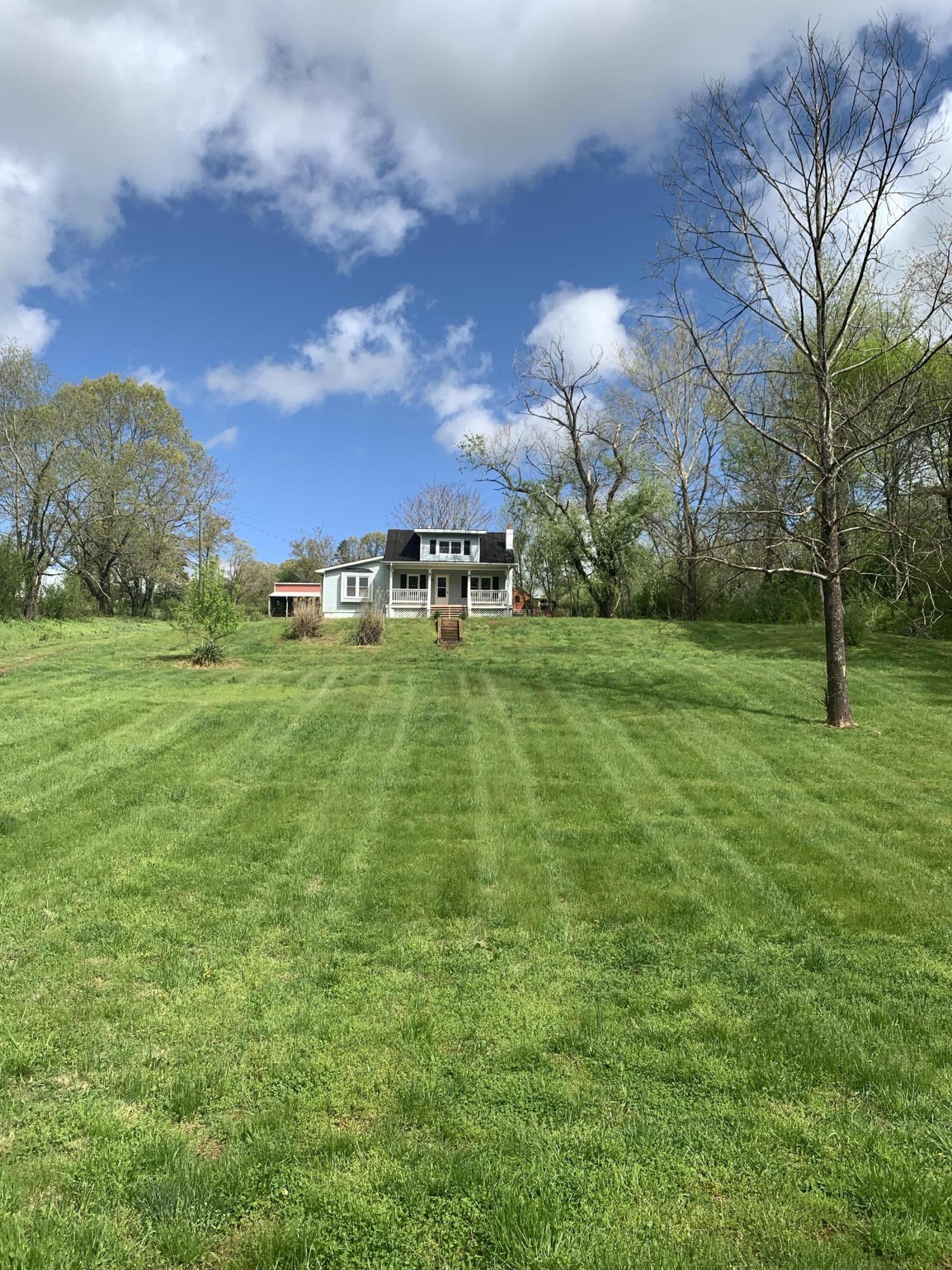 85 Old Ferrum Road Ferrum, VA 24088 - Photo 2 of 60 a backyard of a house with lots of green space