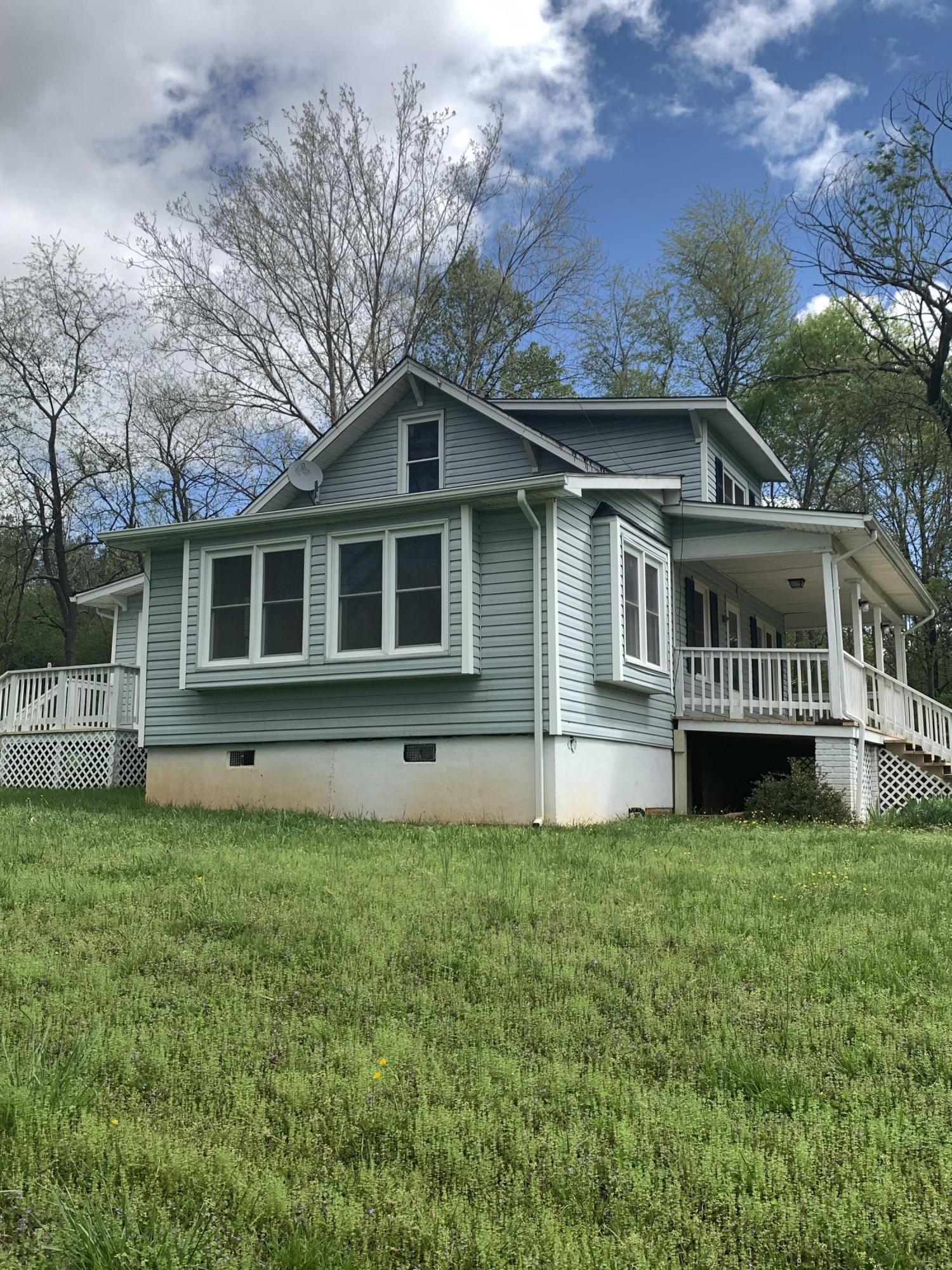 85 Old Ferrum Road Ferrum, VA 24088 - Photo 13 of 60 a view of a house with a yard