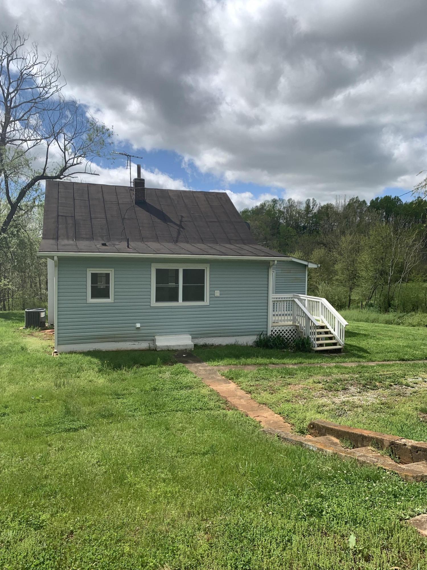 85 Old Ferrum Road Ferrum, VA 24088 - Photo 17 of 60 a view of a house with backyard