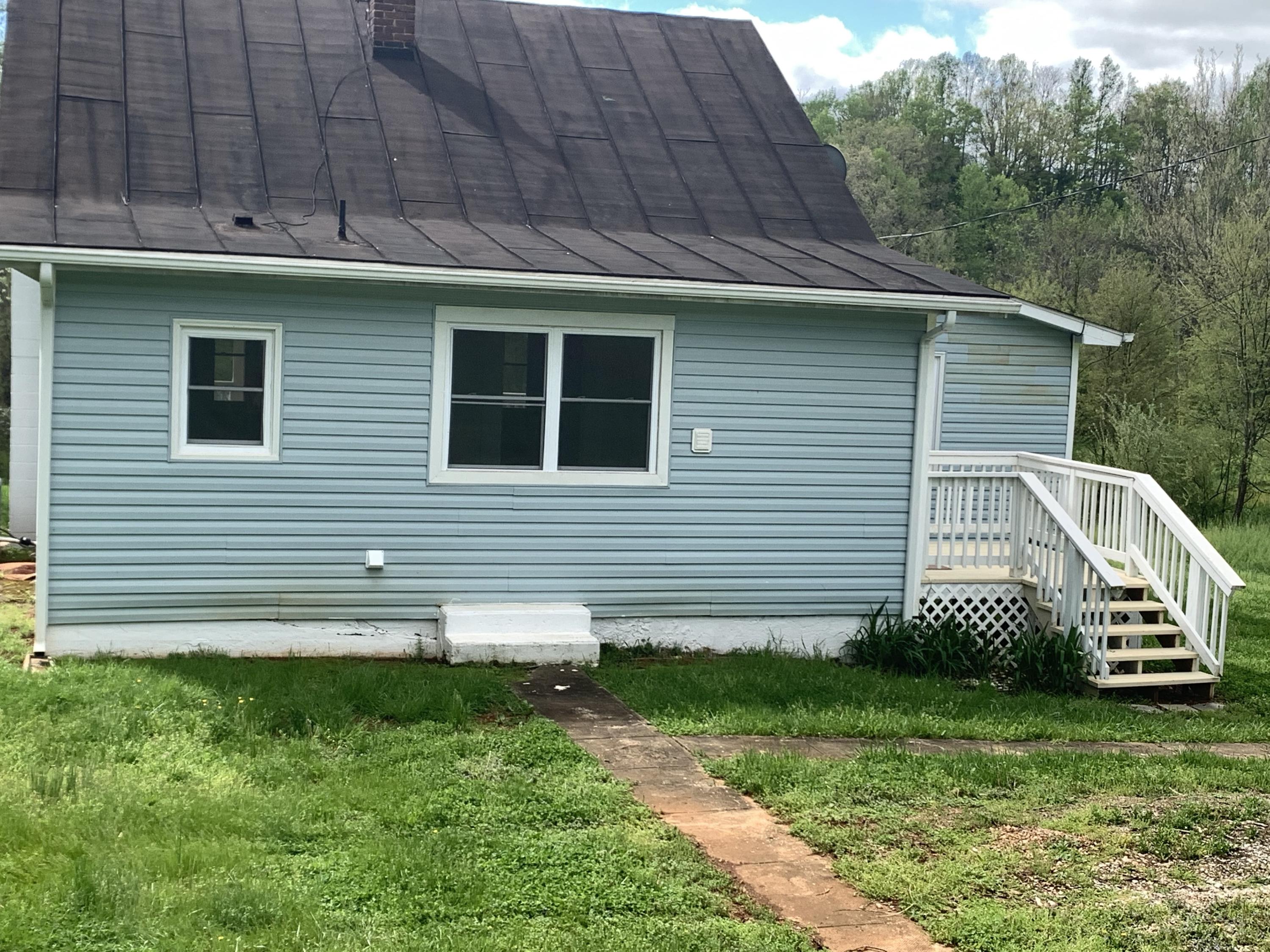 85 Old Ferrum Road Ferrum, VA 24088 - Photo 19 of 60 a view of a house with a yard