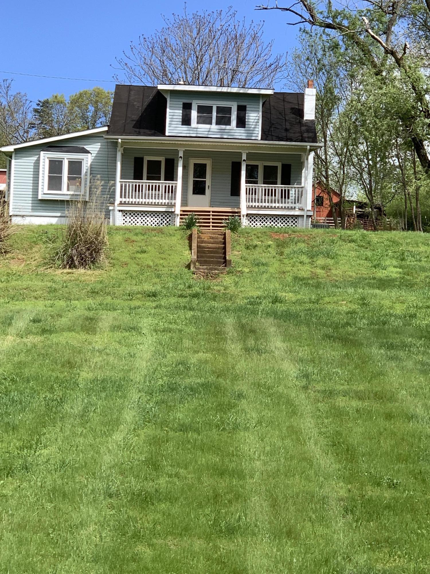 85 Old Ferrum Road Ferrum, VA 24088 - Photo 3 of 60 a front view of a house with a yard