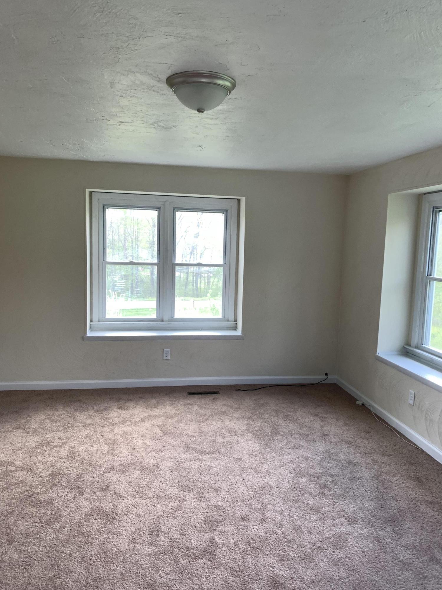 85 Old Ferrum Road Ferrum, VA 24088 - Photo 50 of 60 an empty room with a window