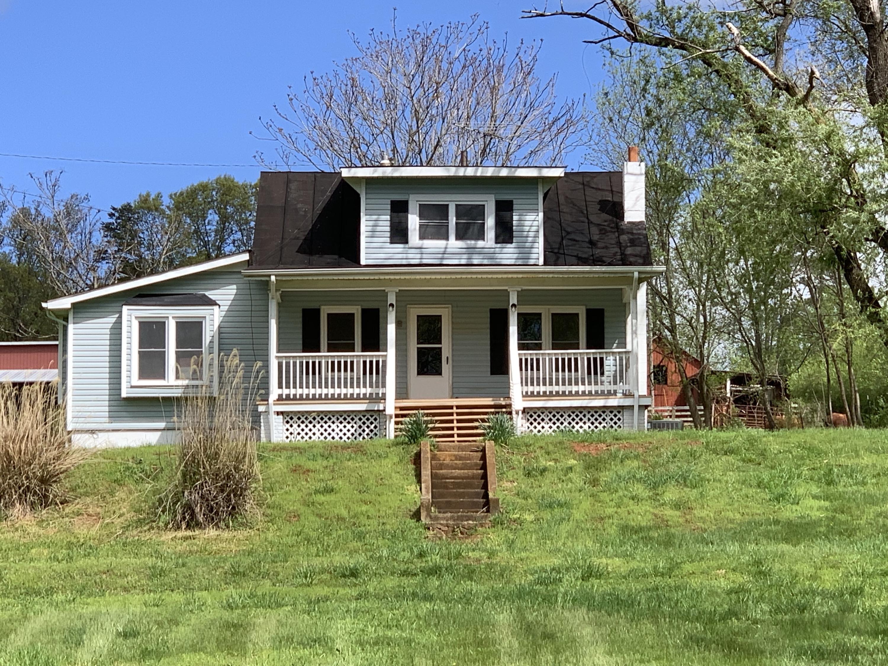 85 Old Ferrum Road Ferrum, VA 24088 - Photo 6 of 60 a house view with a garden space