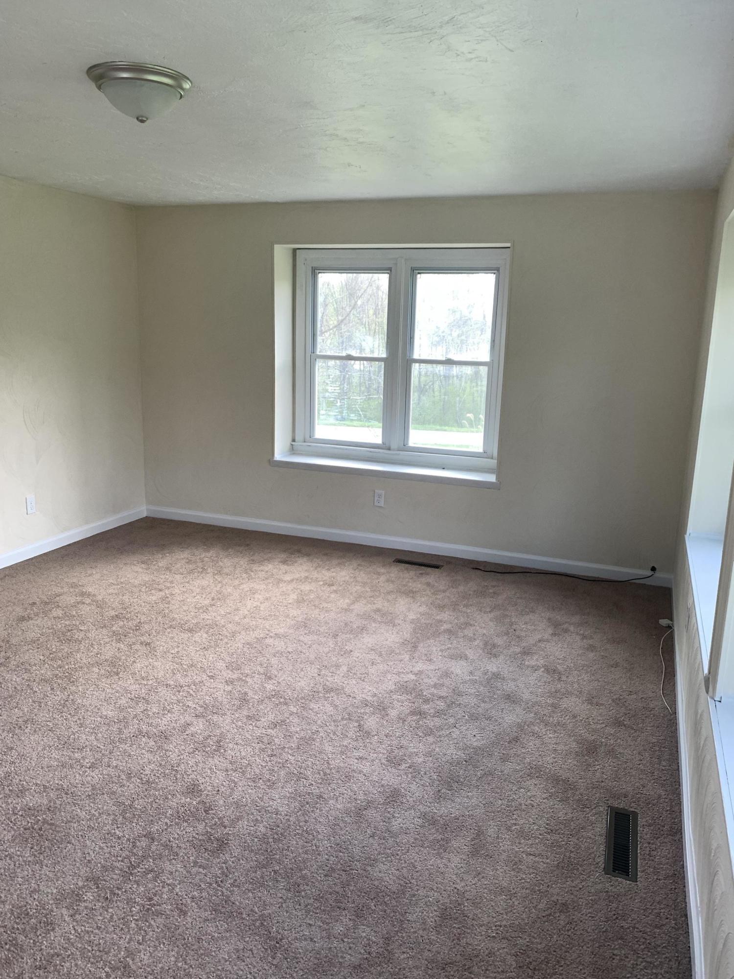 85 Old Ferrum Road Ferrum, VA 24088 - Photo 51 of 60 an empty room with a window
