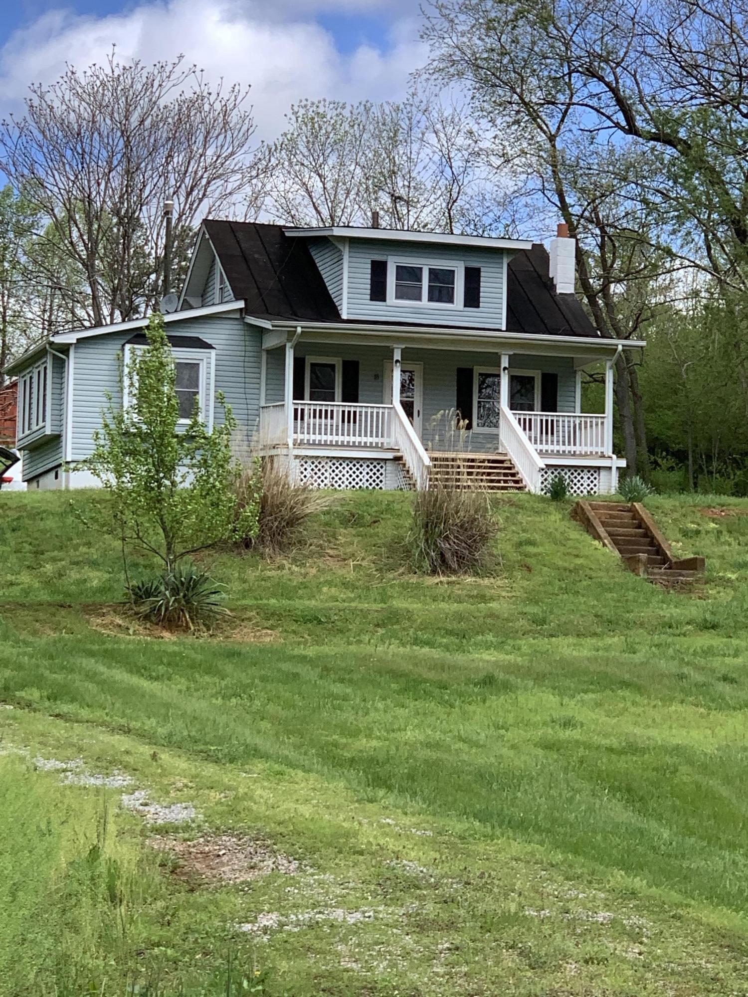 85 Old Ferrum Road Ferrum, VA 24088 - Photo 10 of 60 a front view of a house with garden