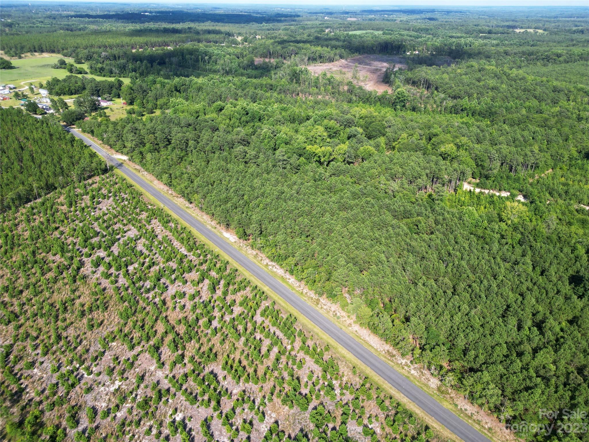 Tbd Hightower Road Morven, NC 28119 - Photo 14 of 20 a view of a green field with lots of bushes