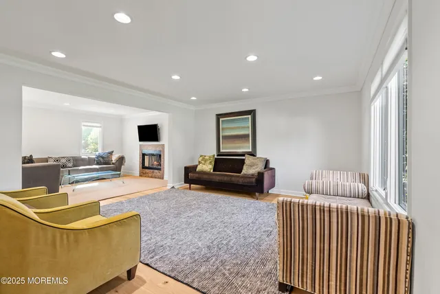 a view of an empty room with windows