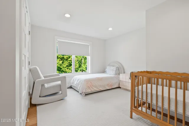 an aerial view of residential house with swimming pool and outdoor space