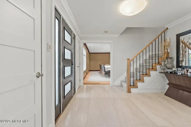 a bathroom with a shower and a sink