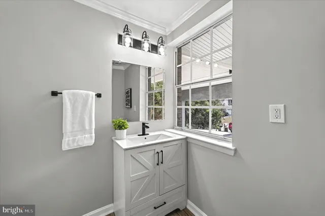 a view of cabinets and window