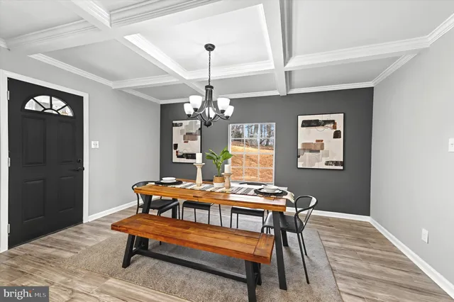a reading room with furniture and wooden floor