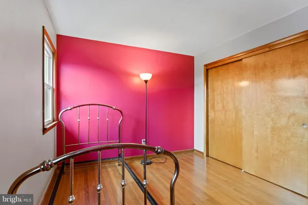 a view of a living room with bathroom
