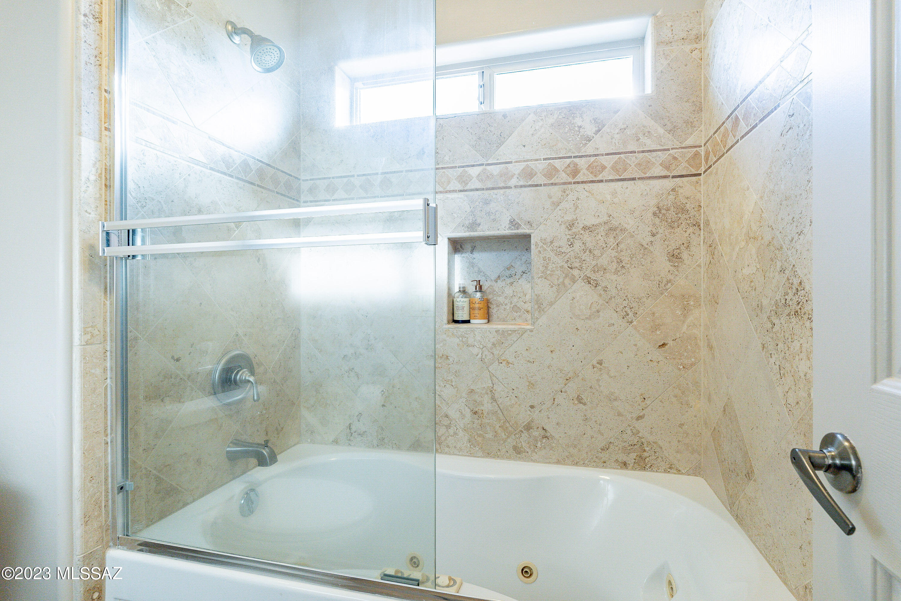 1135 Via San Francisco Rio Rico, AZ 85648 - Photo 22 of 29 a bathroom with a bathtub