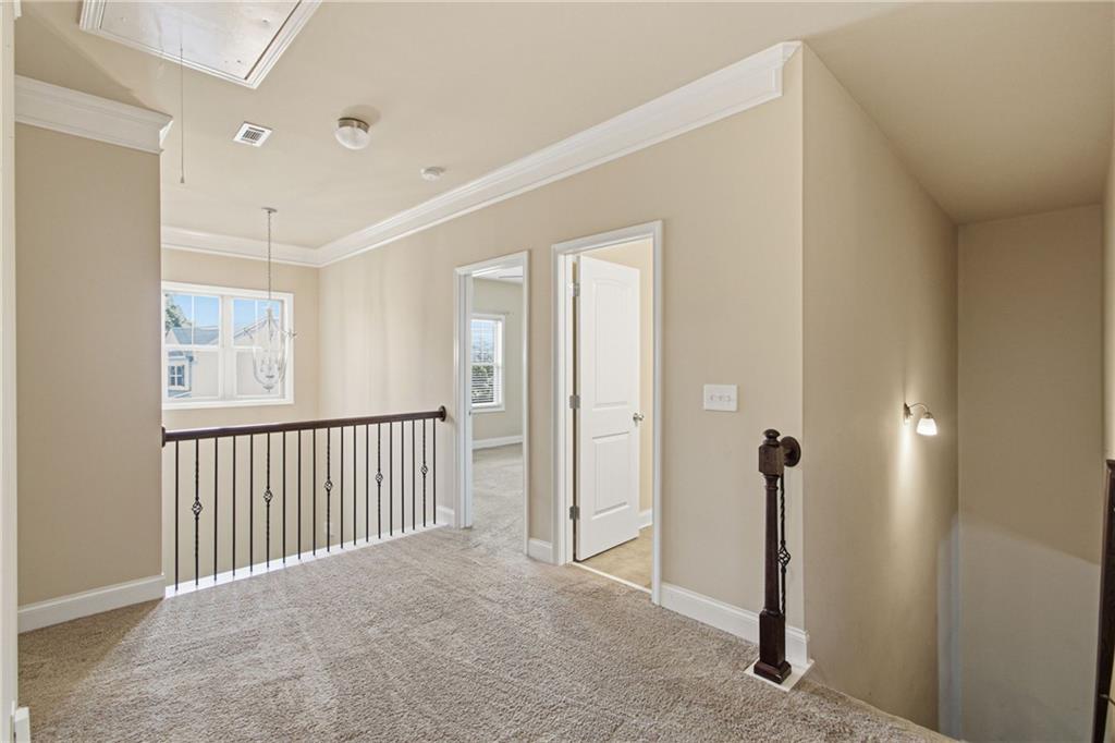 114 Madison Street Canton, GA 30115 - Photo 18 of 39 a view of a room with a large window and closet area