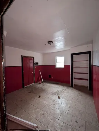 a view of an empty room and window