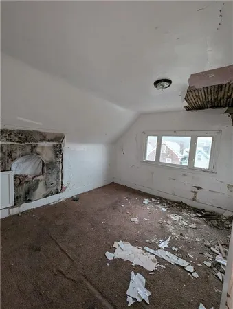 a view of an empty room and window