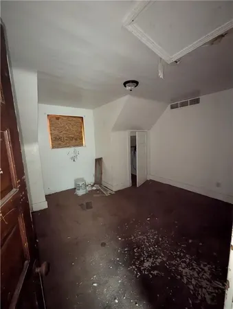 a view of livingroom with furniture and a window