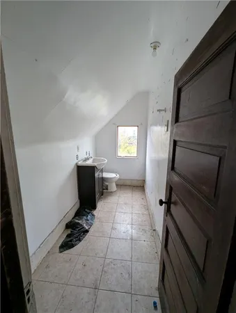 a view of a kitchen with storage and utility