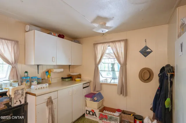 a view of storage and utility room with toys