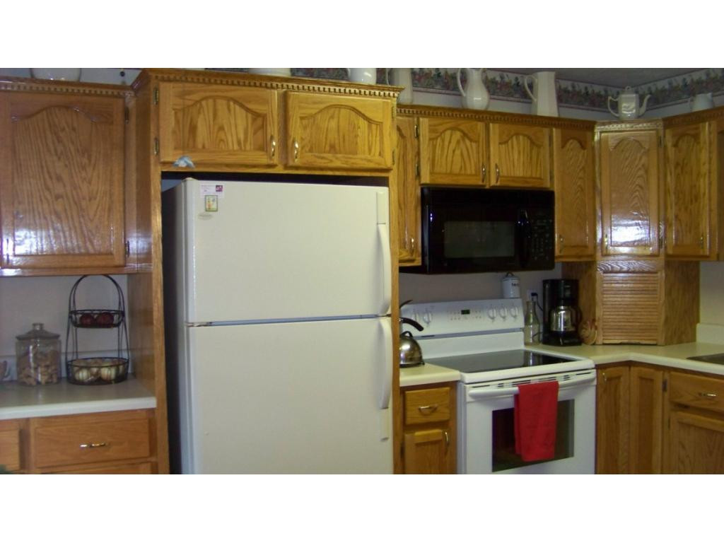 1090 Reece Hill Road Mountain City, TN 37683 - Photo 7 of 34 CUSTOM OAK CABINETS IN KITCHEN