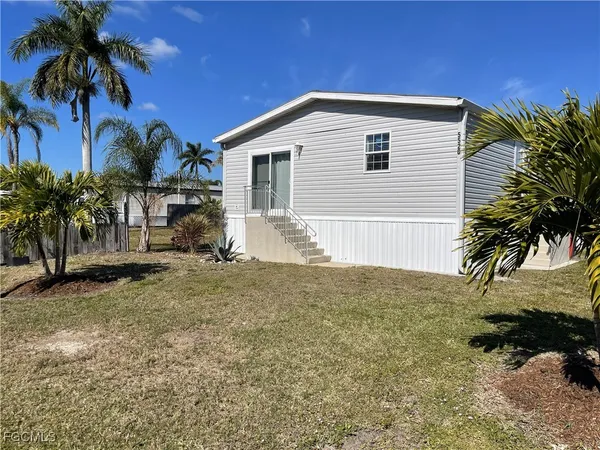 a view of a backyard of a house