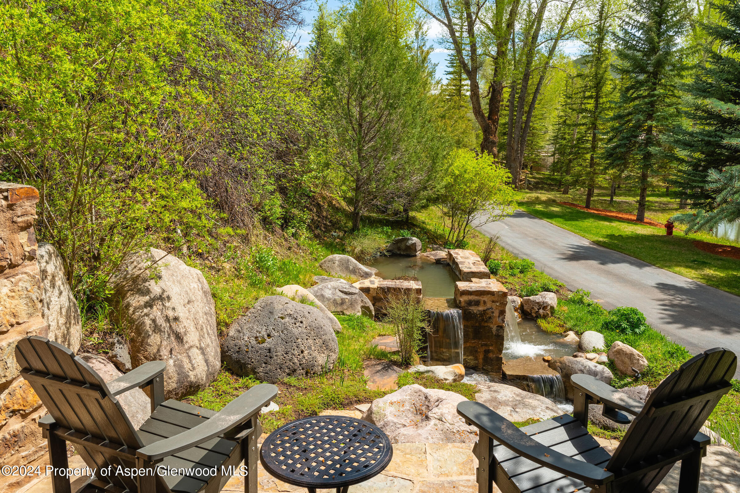 2005 Watson Divide Road Snowmass, CO 81654 - Photo 35 of 56 Deck with Water Feature off Guest House