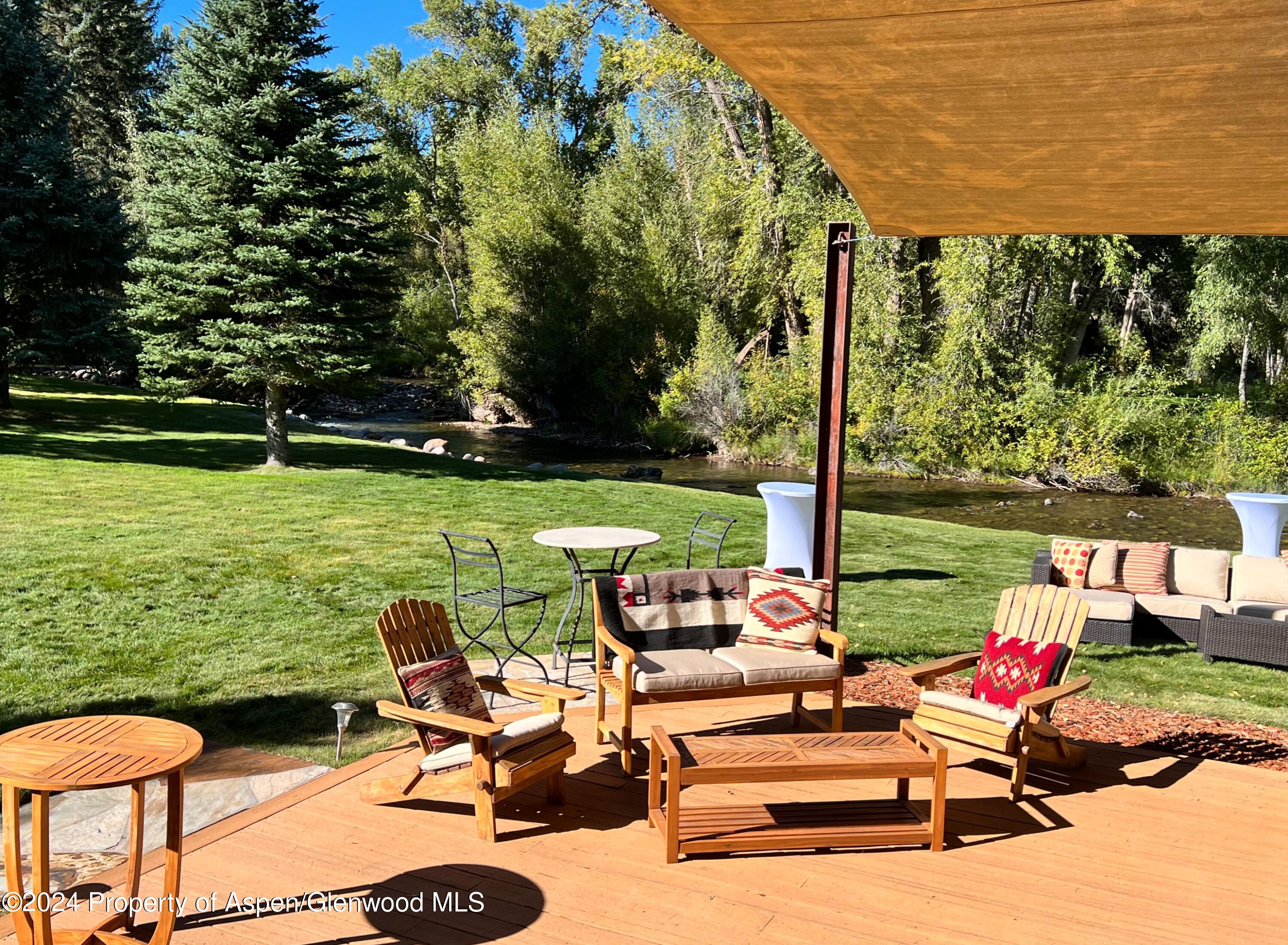 2005 Watson Divide Road Snowmass, CO 81654 - Photo 45 of 56 Outdoor Living Next to Creek