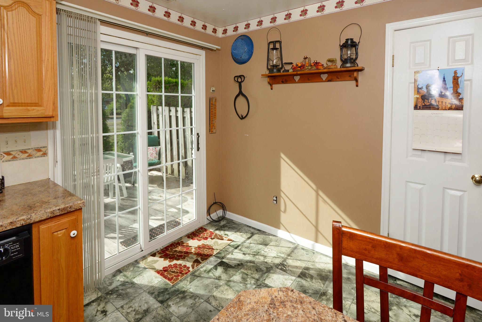 315 Christopher Court Lansdale, PA 19446 - Photo 13 of 27 Kitchen with sliders to deck