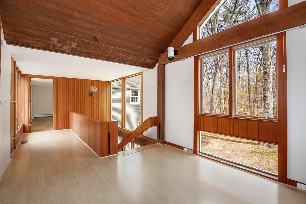 211 Pope Road Acton, MA 01742 - Photo 11 of 29 a view of an empty room with a window