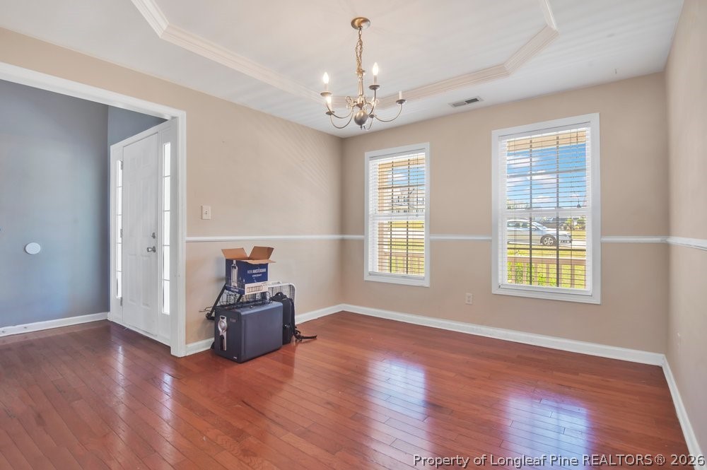 10 Pender Road Spring Lake, NC 28390 - Photo 5 of 35 a living room with hard wood floors and a window