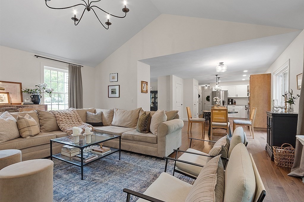 83 Russell Hill Road Brookline, NH 03033 - Photo 14 of 42 a living room with furniture kitchen view and a window