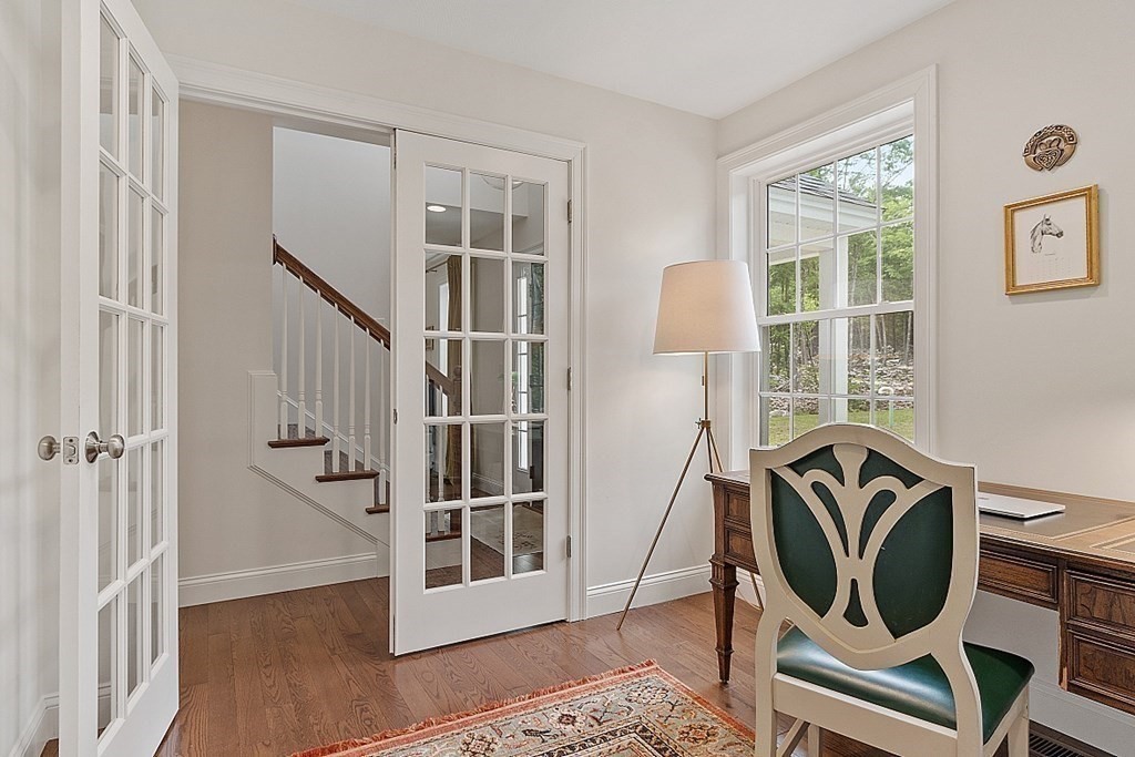 83 Russell Hill Road Brookline, NH 03033 - Photo 19 of 42 a view of a entryway with wooden floor and windows