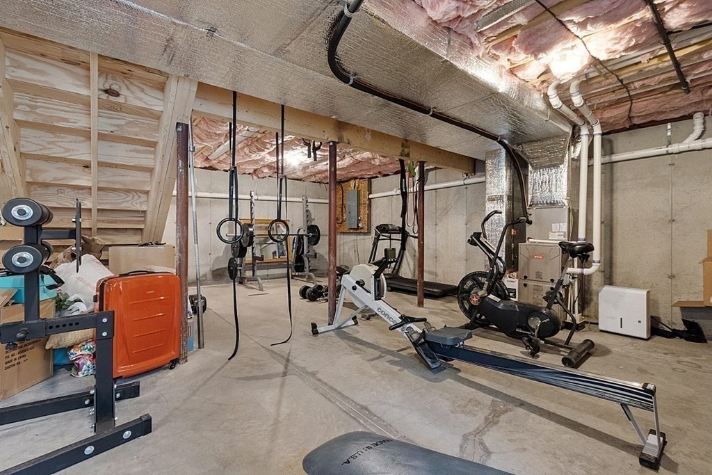 83 Russell Hill Road Brookline, NH 03033 - Photo 36 of 42 a view of a room with gym equipment
