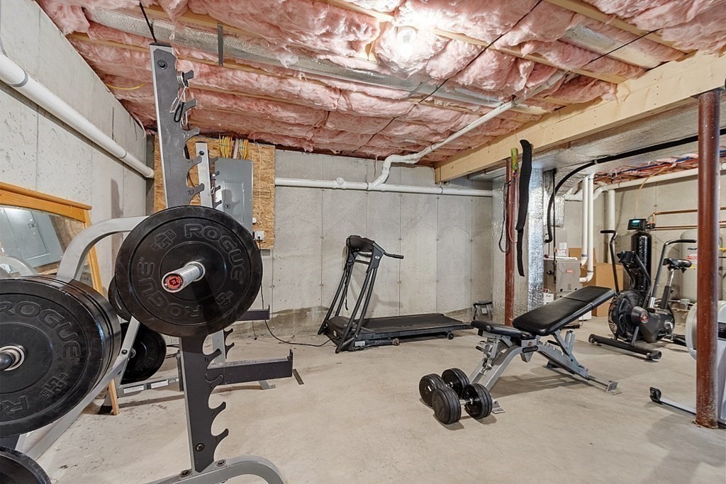 83 Russell Hill Road Brookline, NH 03033 - Photo 37 of 42 a view of a room with gym equipment