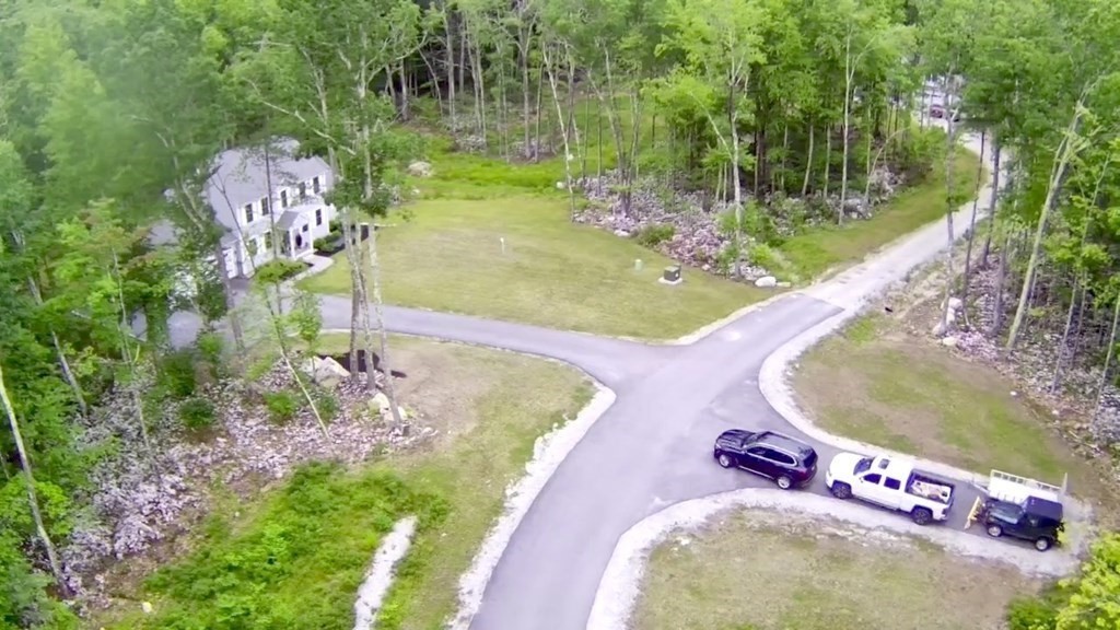 83 Russell Hill Road Brookline, NH 03033 - Photo 42 of 42 a view of a swimming pool with a yard