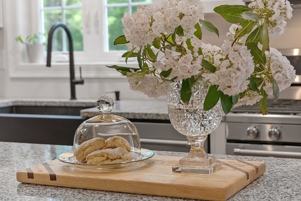 83 Russell Hill Road Brookline, NH 03033 - Photo 7 of 42 a vase of flowers sitting on a table