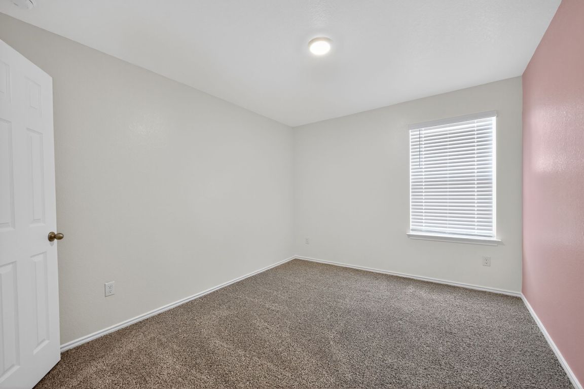 596 Wyatt Way Jarrell, TX 76537 - Photo 5 of 21 an empty room with a window