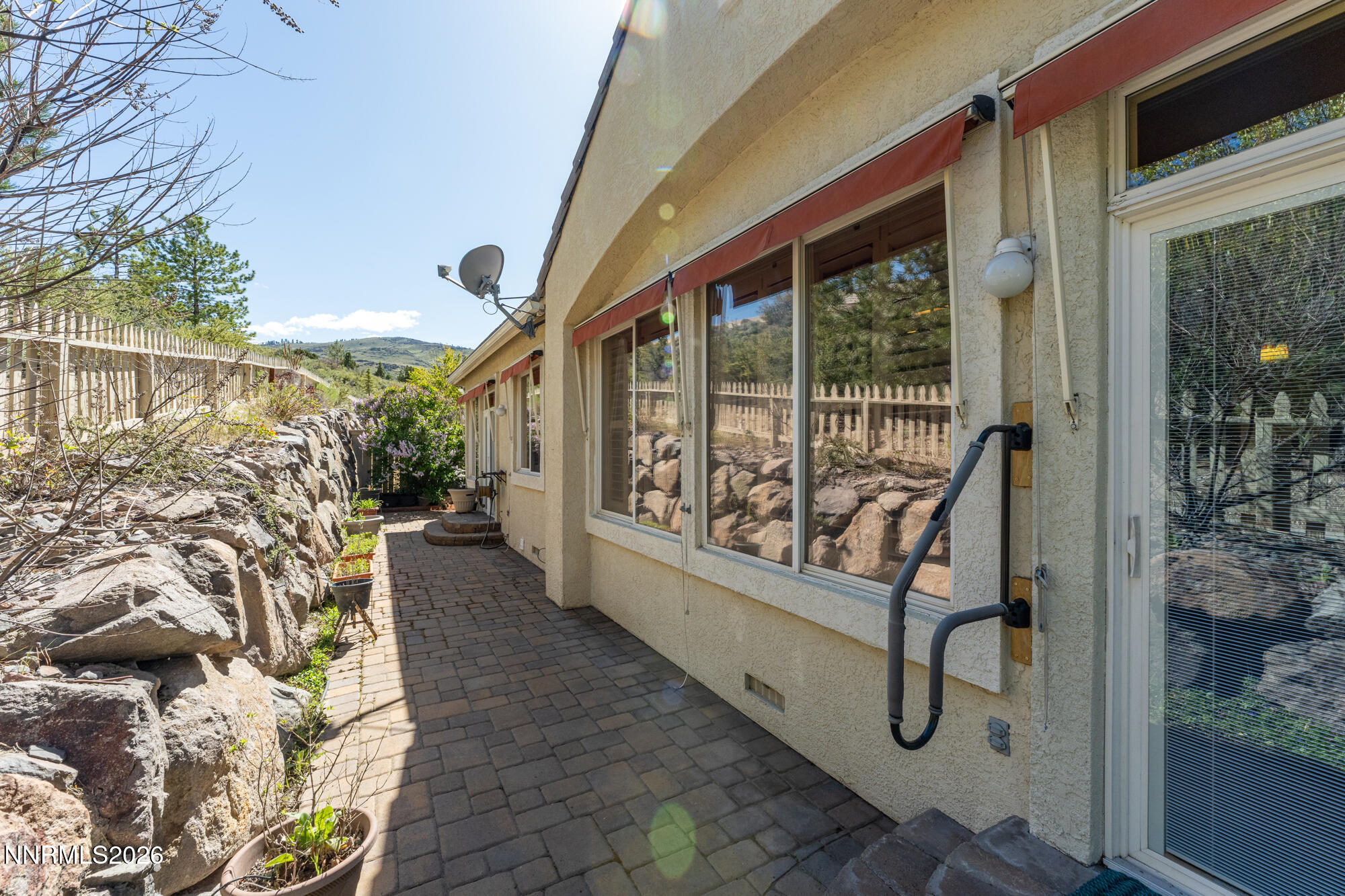1840 Hunter Creek Road Reno, NV 89519 - Photo 31 of 39 a view of a porch with furniture and a gate