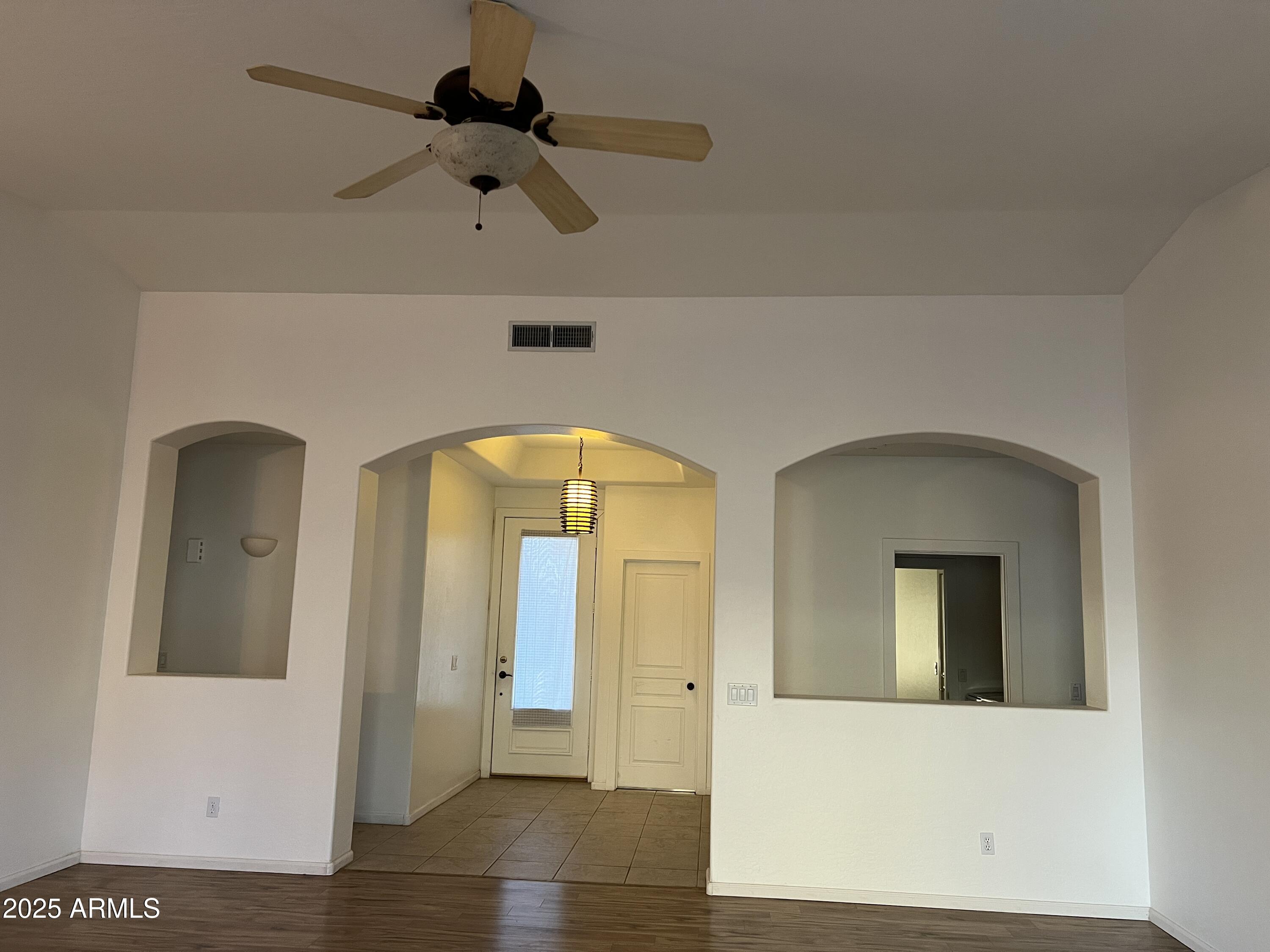 4484 East Redfield Court Gilbert, AZ 85234 - Photo 11 of 25 a view of entryway and hall with wooden floor