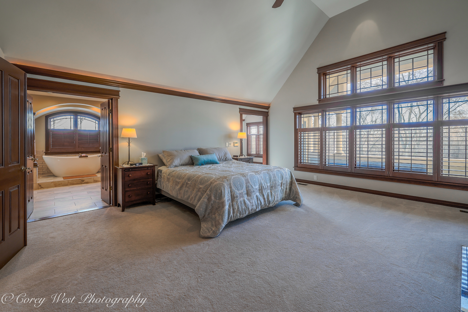 N004 Alexander Drive Geneva, IL 60134 - Photo 31 of 75 a spacious bedroom with a bed and a large window
