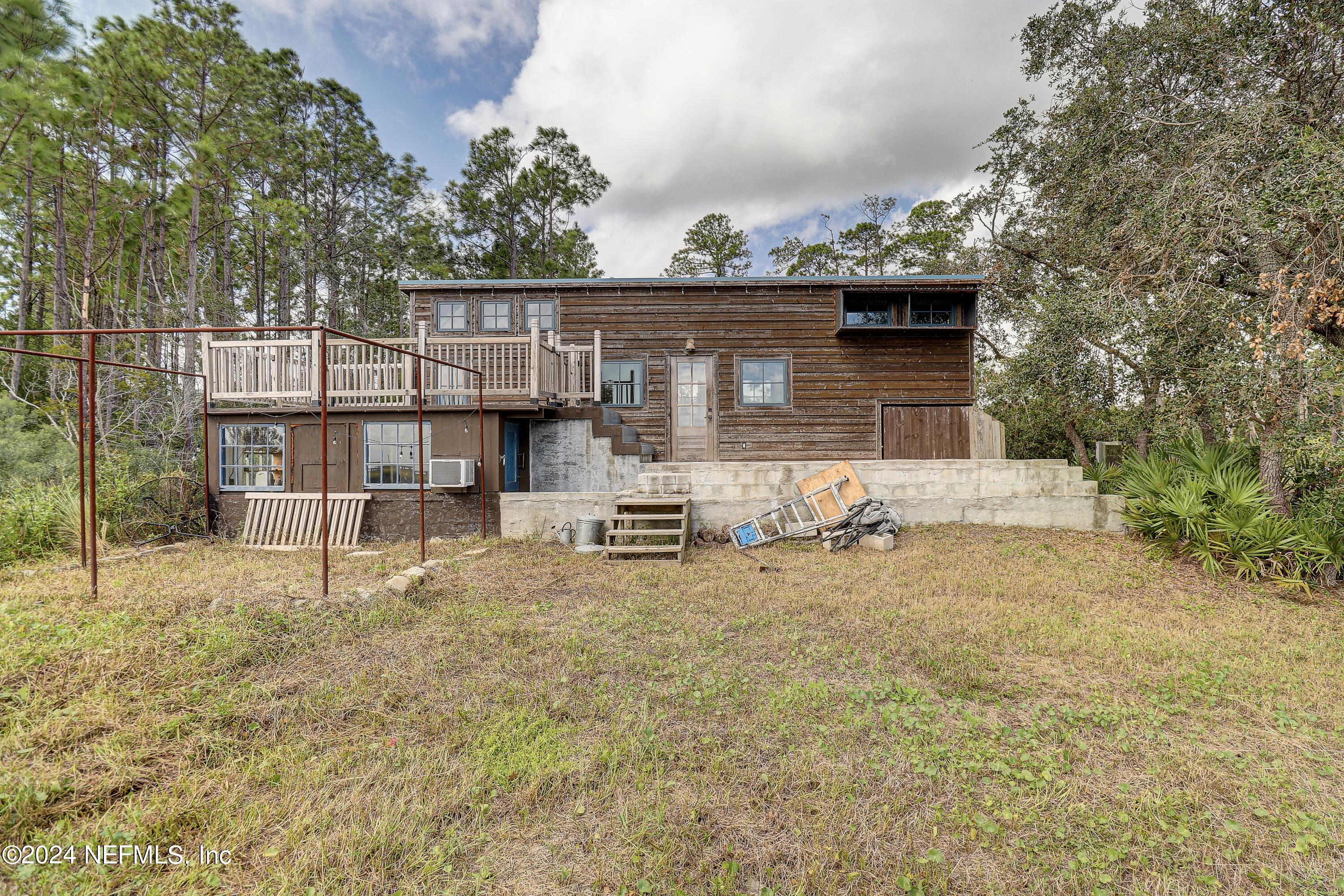 15649 Shellcracker Road Jacksonville, FL 32226 - Photo 2 of 35 a view of a house with backyard and sitting area