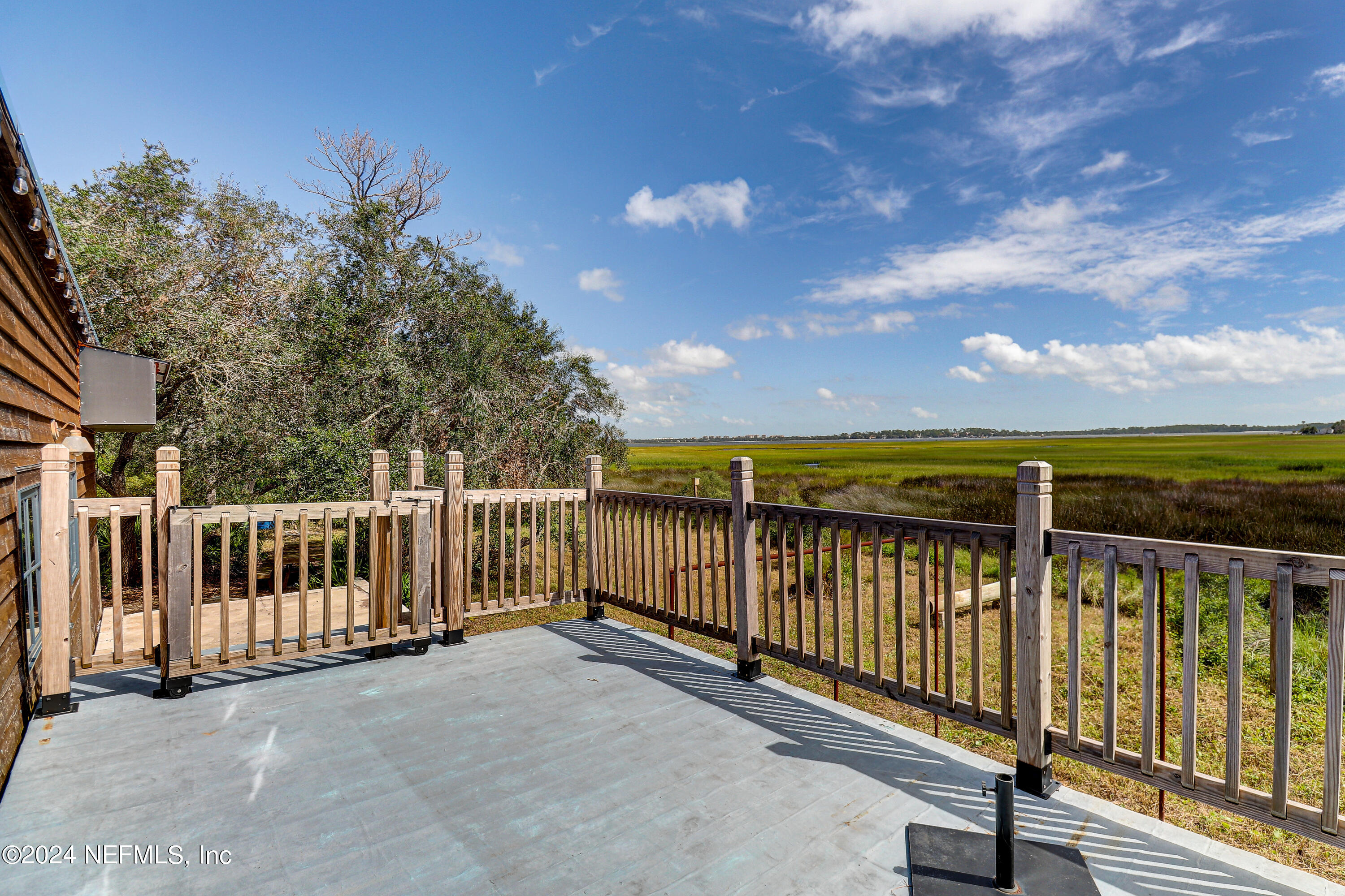 15649 Shellcracker Road Jacksonville, FL 32226 - Photo 6 of 35 a view of a balcony with wooden fence