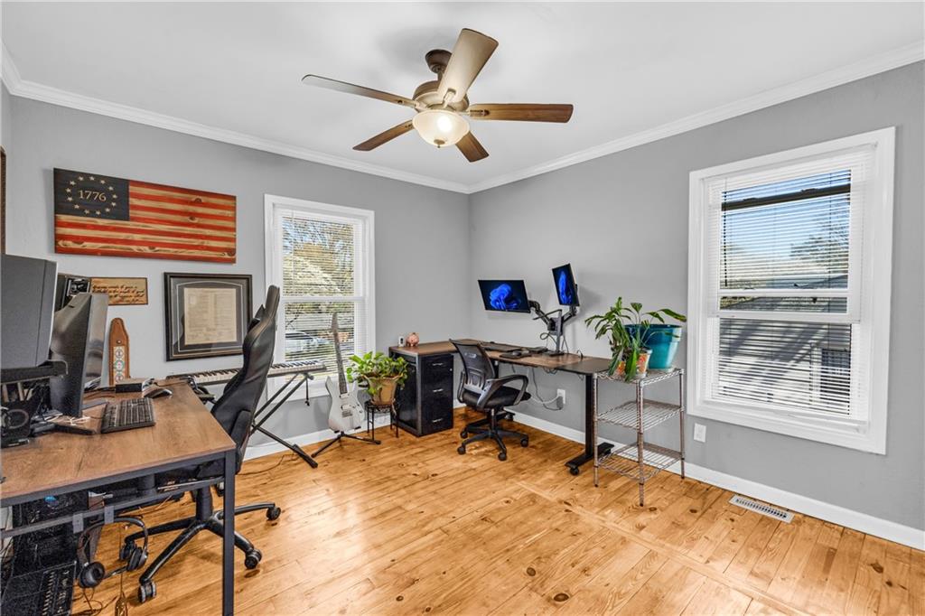 3351 Phillip Circle Decatur, GA 30032 - Photo 11 of 29 a view of a workspace with furniture and a window